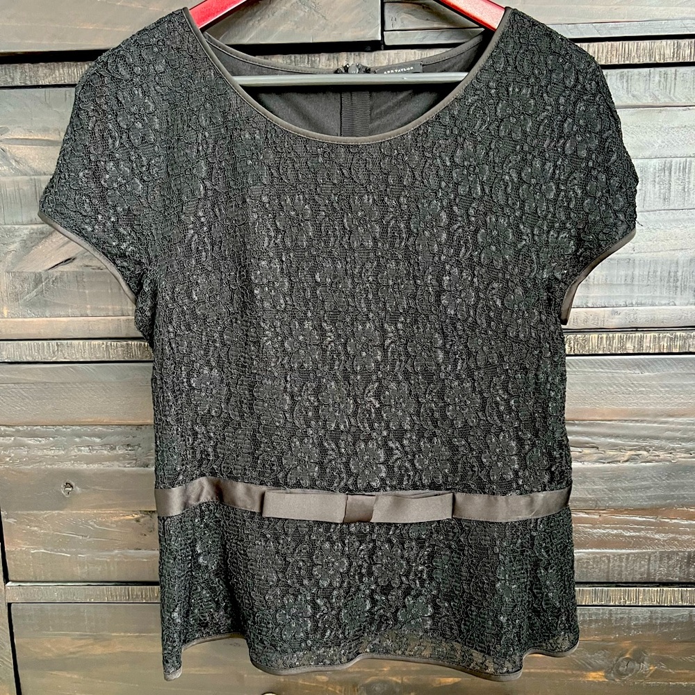 Ann Taylor black lace peplum blouse. Size 8.